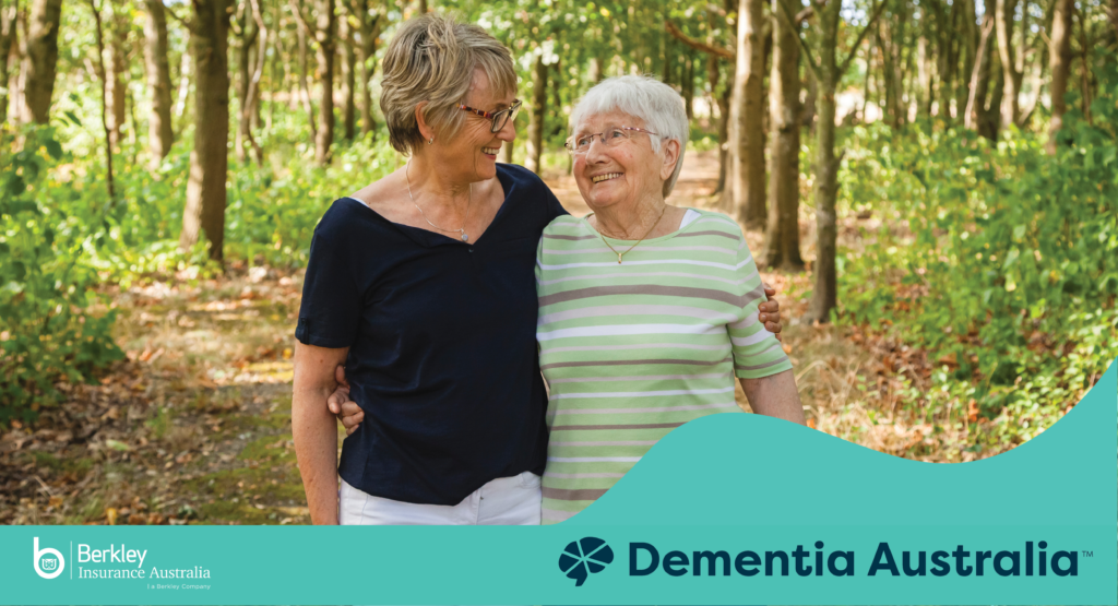 Berkley Insurance Australia Partnering with Dementia Australia. Picture of 2 people walking in the woods