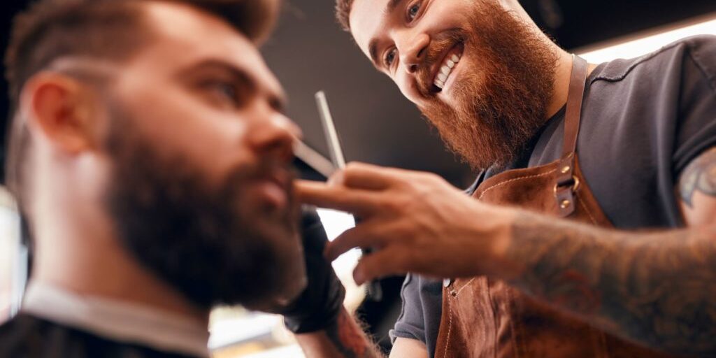 Sole Trader Management Liability (picture of a barber working)